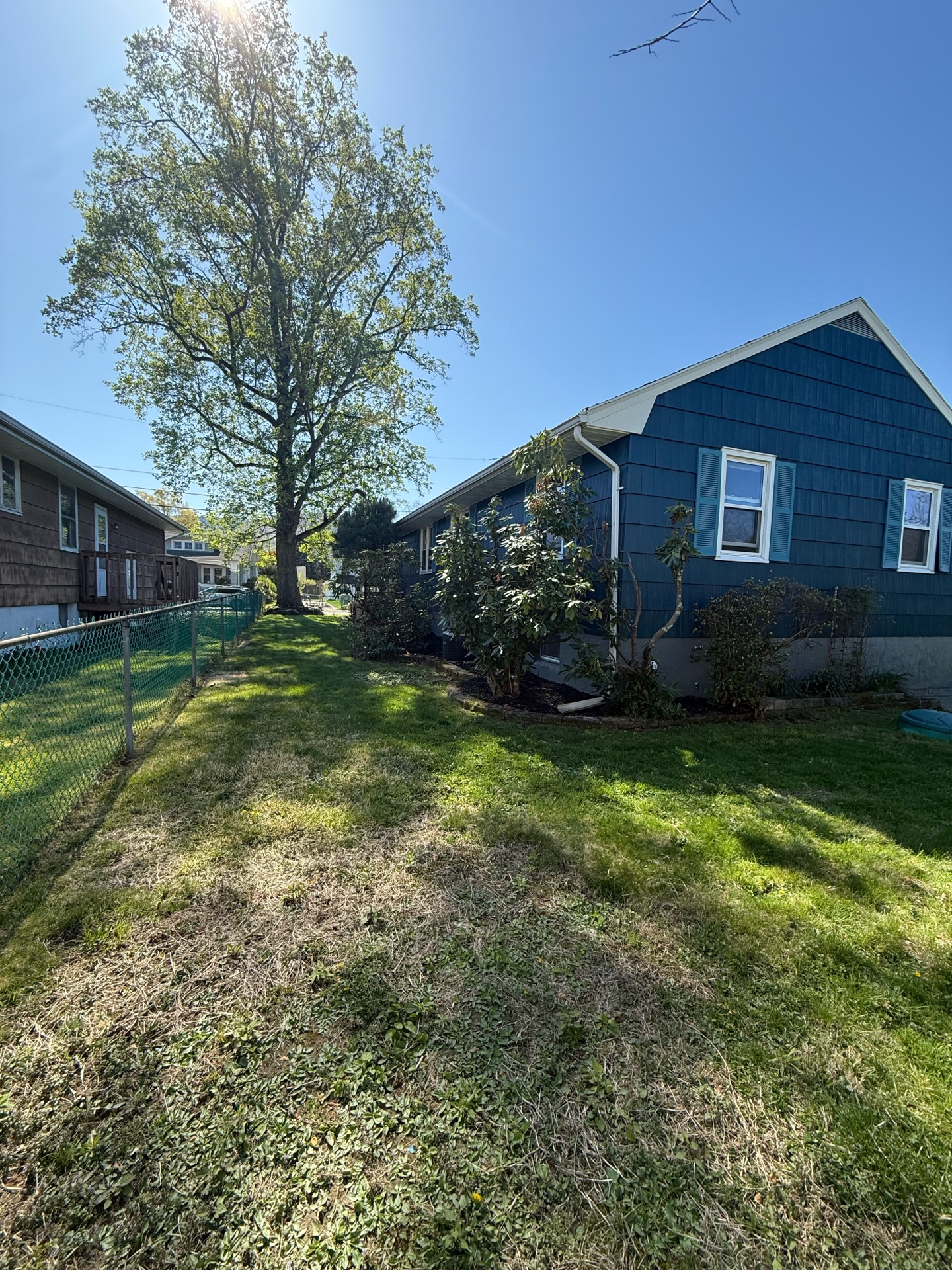Rear lawn and side elevation