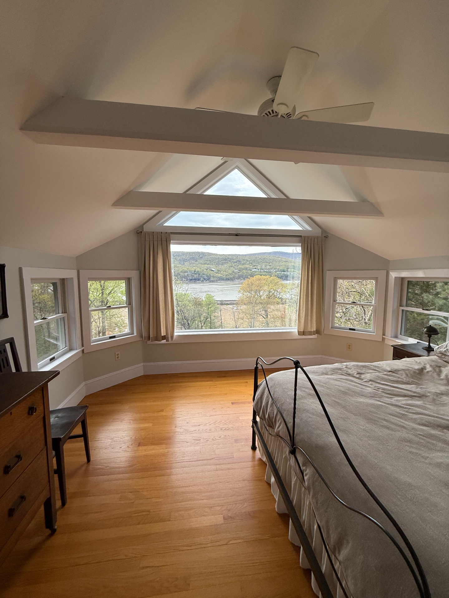 Primary bedroom with broad Hudson River view at 8 Manitou Ridge